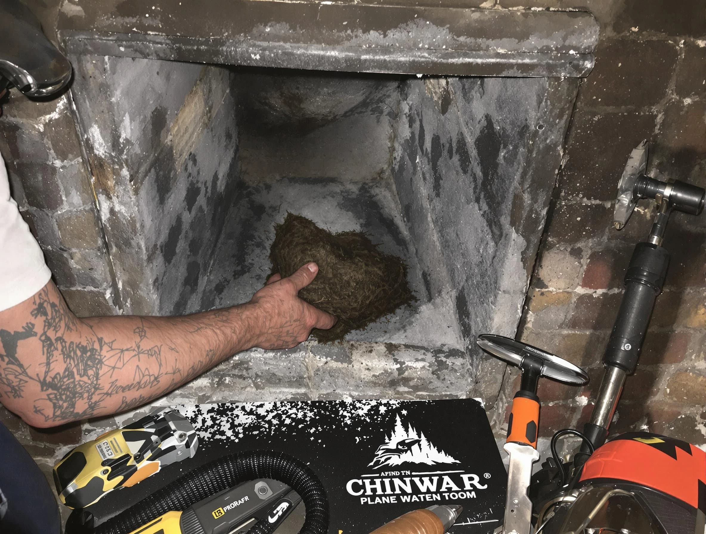 Swissvale Chimney Sweep safely removing debris and screening chimney in Swissvale, PA
